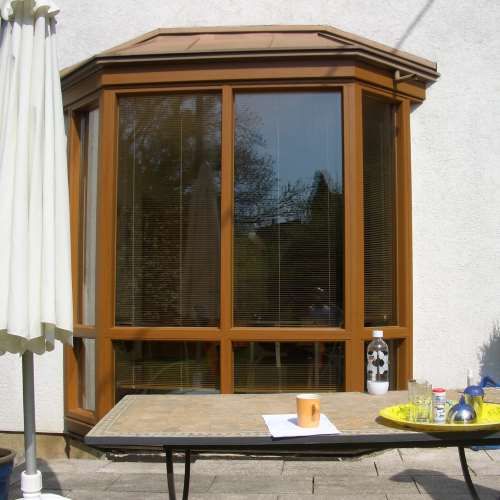 Wintergarten verblendet an Fertighaus