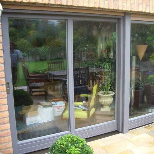 Hebeschiebetüre verblendet mit Aluminium in grau