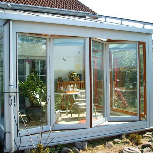 Falttüre an Wintergarten verkleidet